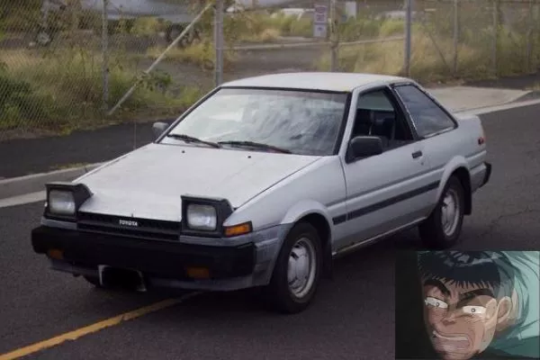 A picture of Itsuki and the Toyota AE85