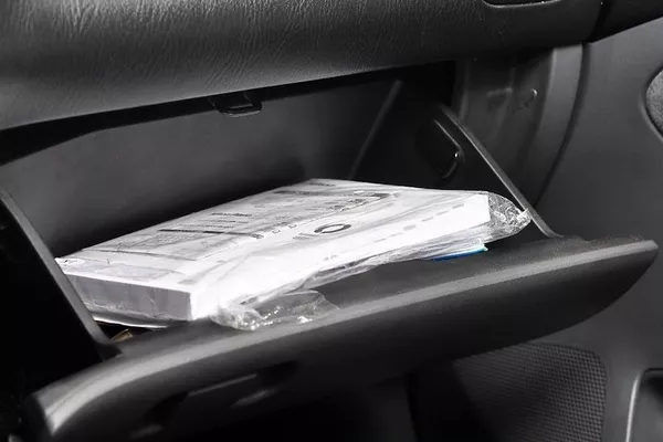 car's manual in the glove compartment