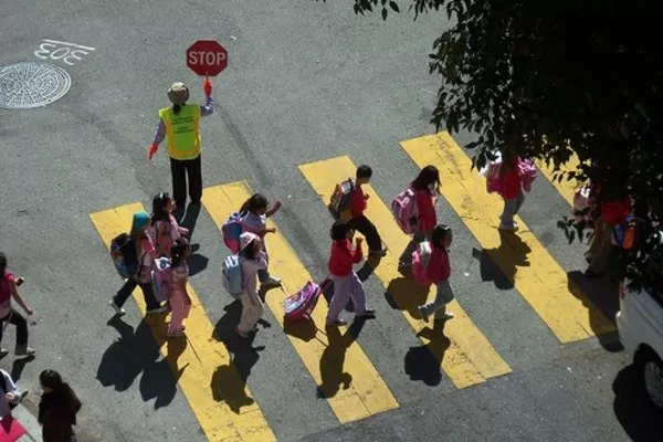 Kids crossing the road
