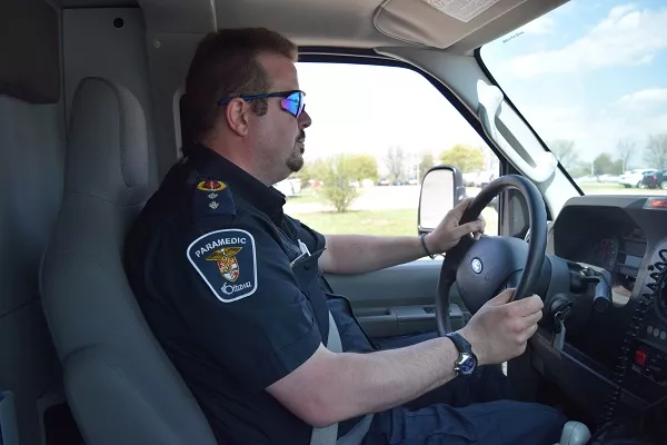 ambulance driver focuses on the road