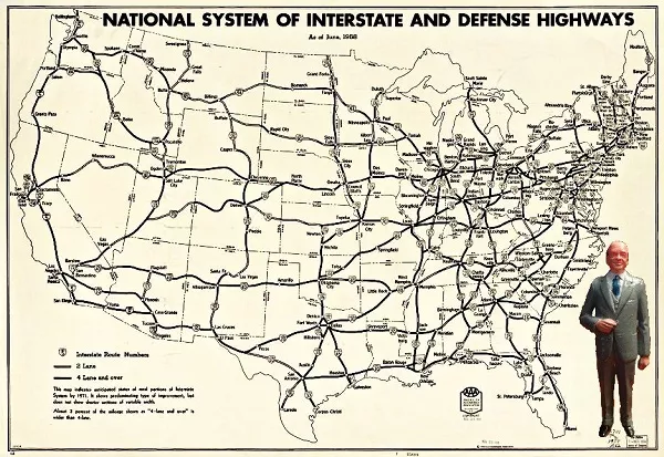 The National Interstate and Defense Highway Act was made to answer the demand for more roads Dwight Eisenhower with a map of the US highway System