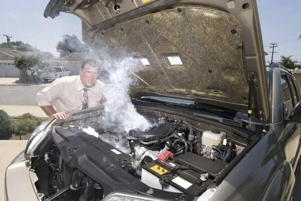 Bring your car in for a needed tune-up Engine smoking