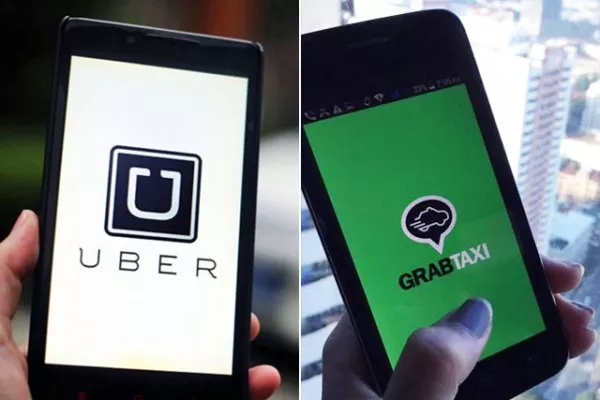 Uber and Grab are running on two mobile phones 