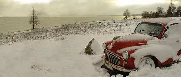 antique car under snow