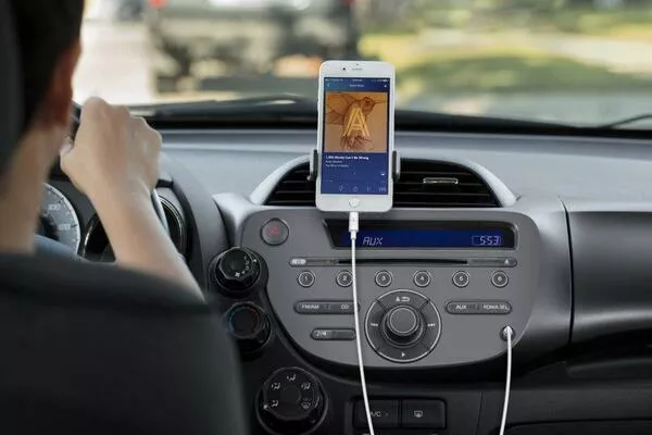 Phone connected to car stereo via aux cord