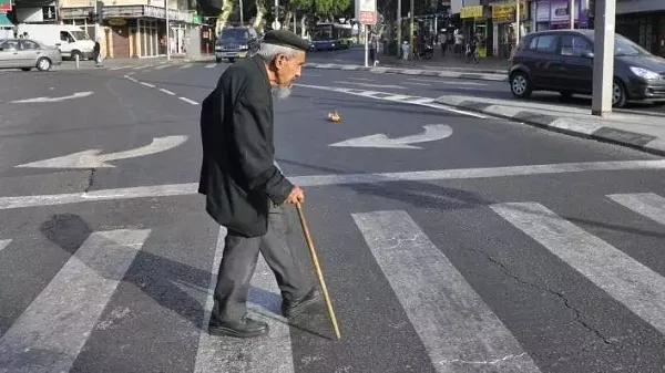 Older people might take more time in crossing the road. Give them that Elderly cross the street