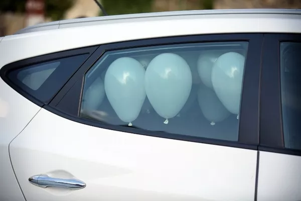 balloons inside a car