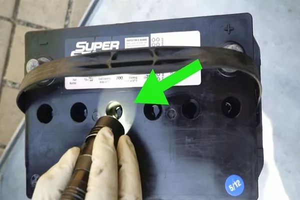 Check the water levels of a car battery