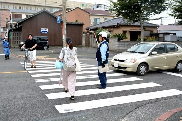 You need to stop at every pedestrian lane to give way to the people who are about to cross the street Stop at pedestrian lane