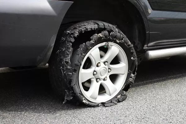 Tire damage often happens during hot weather or when your vehicle is running at high speed blown out car tire