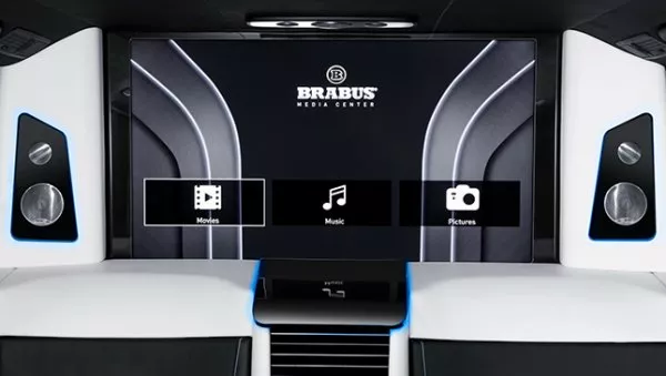 Featuring a built-in 40-inch TV screen, the partition can be raised and lowered TV screen in a car