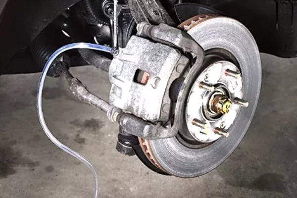 brake fluid hose connected to the car's wheels