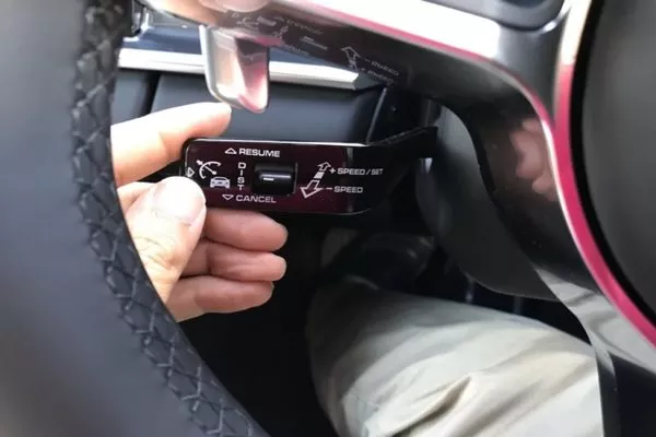 Driver turning off the cruise control