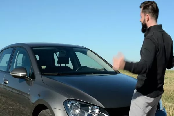A man and a new car