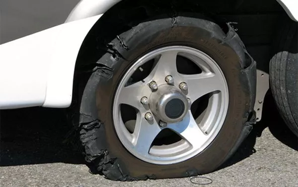 severe damaged car tire