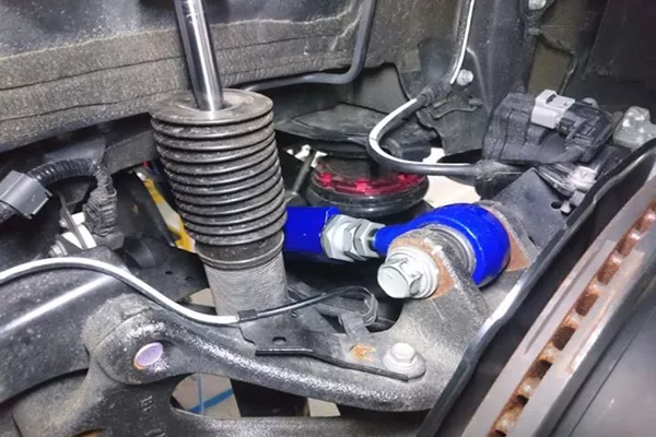 A picture of an installed camber kit