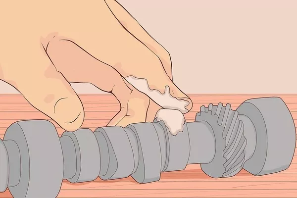 Applying lube to the assembly gear