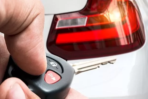 Man pressing the key fob