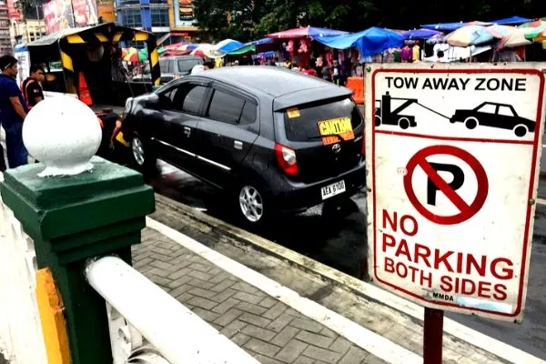 Car Being Towed for Illegal Parking