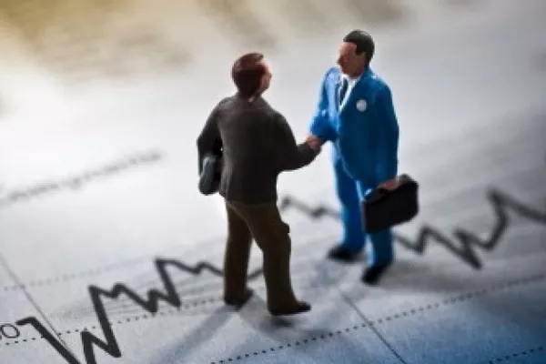 two man-miniature shaking hands