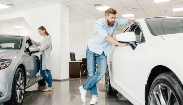 A couple is buying a car