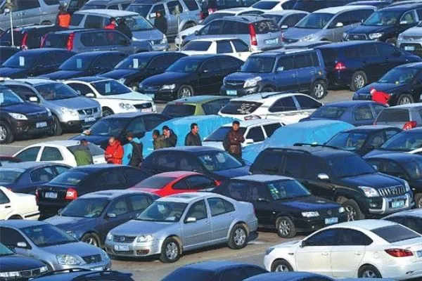 A picture of a large car dealership lot