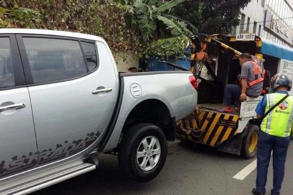 A picture of a car getting towed