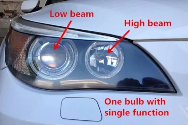 A picture of a car with single beam headlamp bulbs.