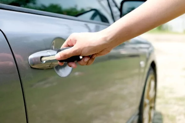 Man opening the car door