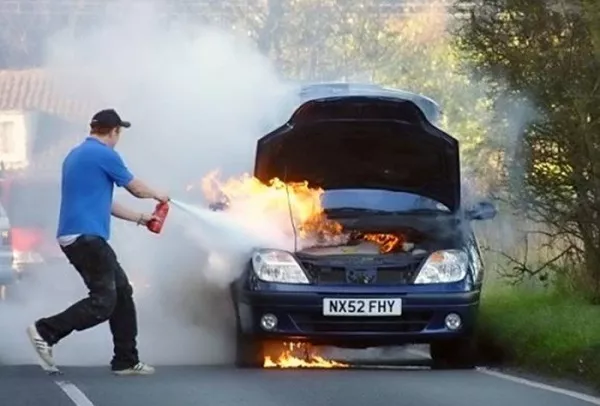 a fire extinguisher - car fire