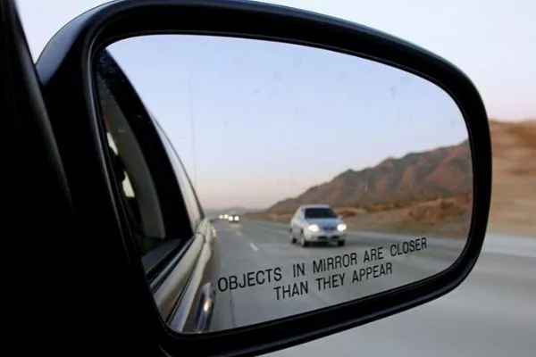 A picture of a side mirror in use.