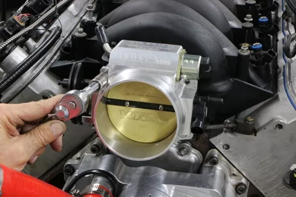 The added volume of air with less resistance will allow faster acceleration and power with this setup by 25 Ps more car tuning_throttle body