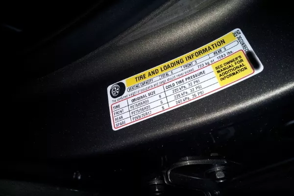 PSI sticker on car tire