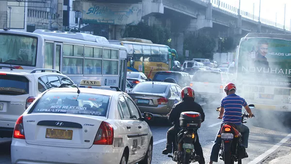 Nothing like the smell of car exhaust in the morning A picture of cars stuck in traffic belching exhaust