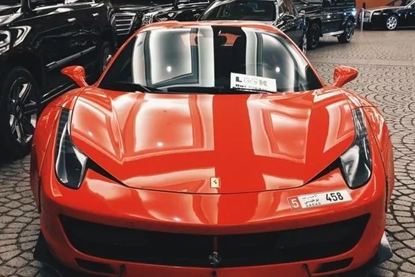 A red Ferrari with coating