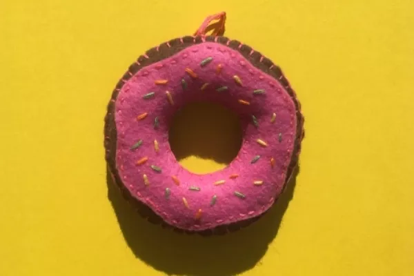 A bulky donut felt car freshener