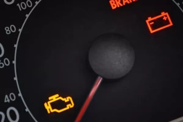 The bane of all car owners. A picture of a car with a check engine light.