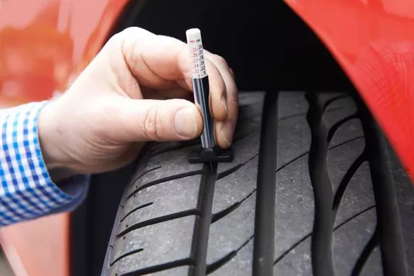 Man checking tire