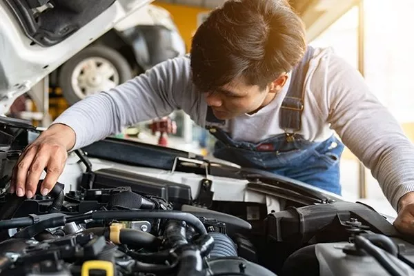 Mechanic checking the engine