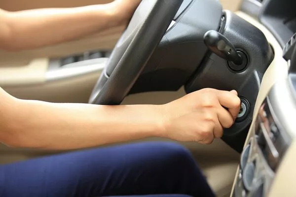 Man starting the car