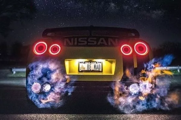 Rear exhaust tips showing engine back fire