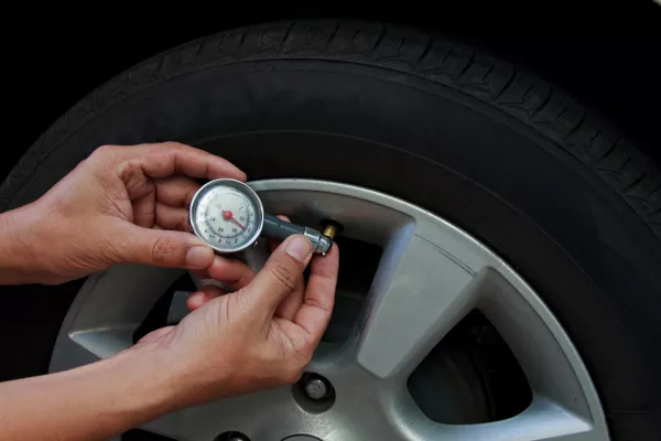 Checking the tire pressure 