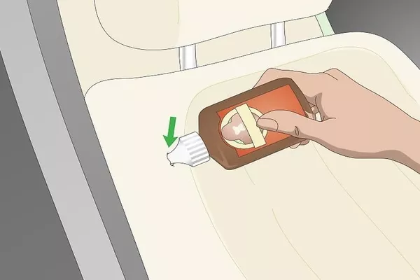 Man putting glue in the car seat