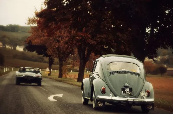 Driving is normal, but when Sunday comes the regular car gets to rest a classic car on the road