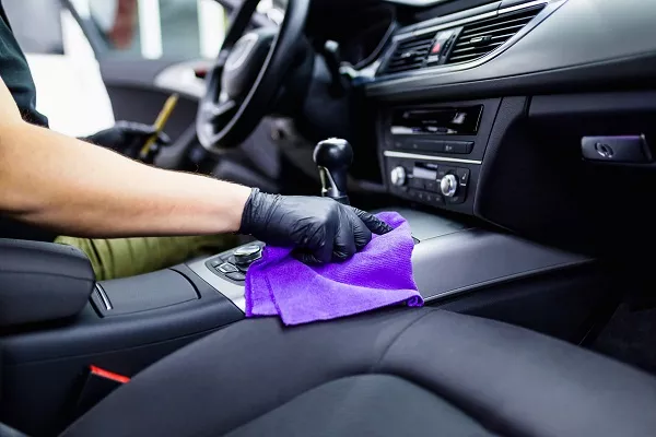 Man cleaning the interior