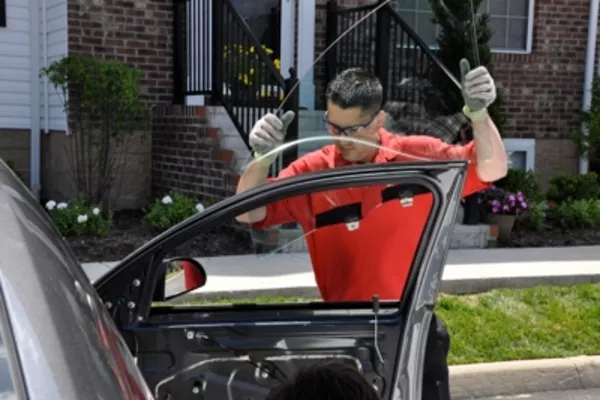 Man replacing car's window