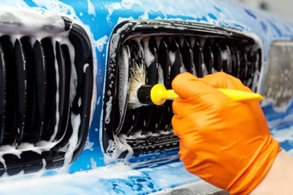 Invest in a good detailing brush Cleaning the car grille