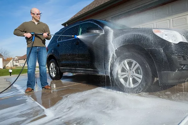 Regularly take a DIY car wash cleaning car with pressure washer