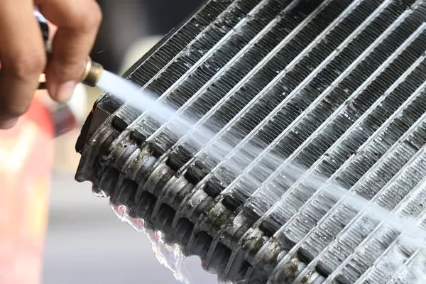 Cleaning the condenser. 