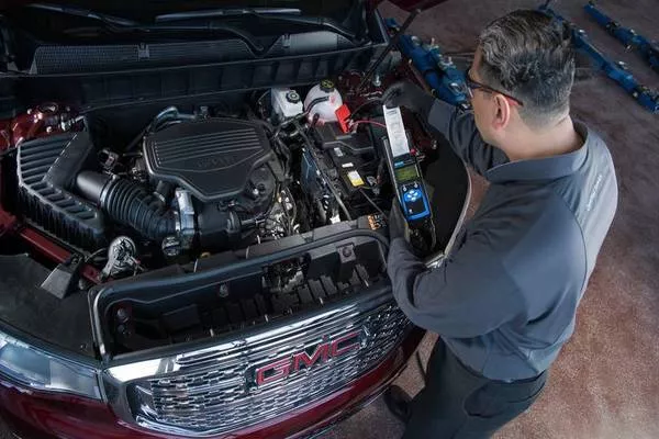 Man checking the car engine